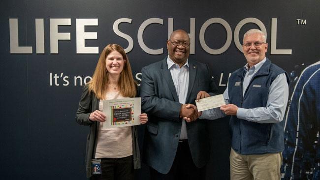 Regions Bank and Books for Kids Present Check